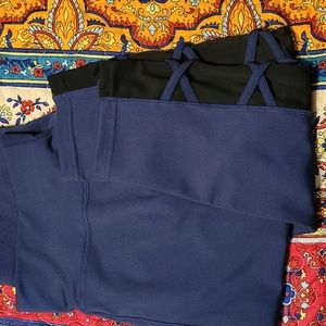 leggings with pockets navy blue with black mesh and crisscross detail on ankle